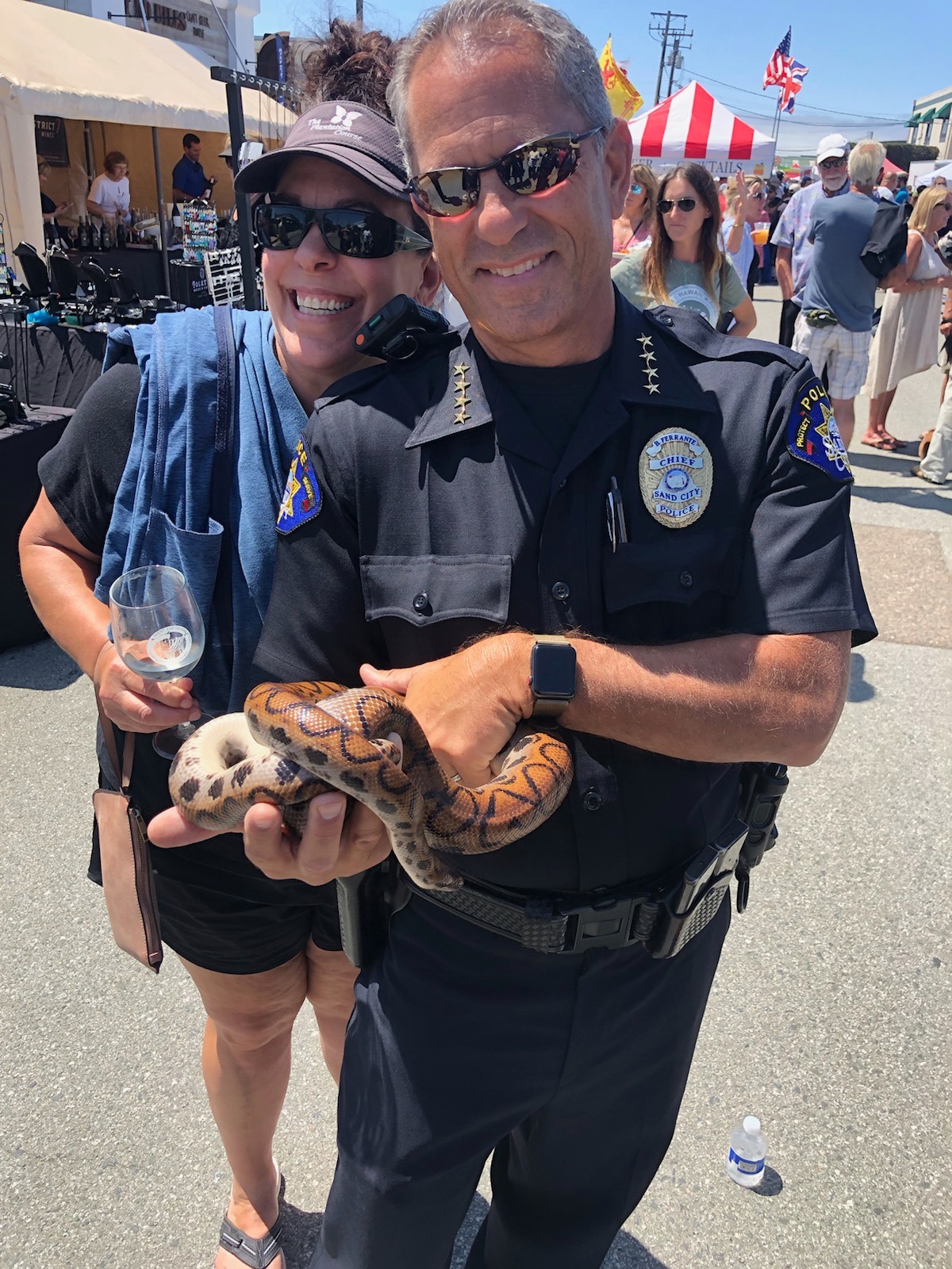 Chief holding snake